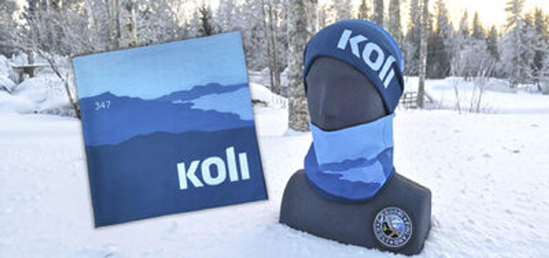 SInisävyinen Koli-putkihuivi, jossa Kolin logo ja maisema